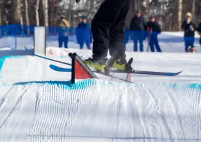 Skier grinding a rail