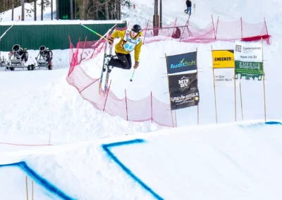 skier spinng on slope jump at norquay