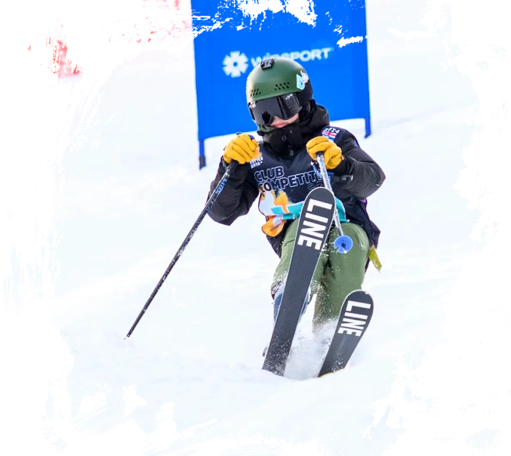 Athlete skijng at a mogul competition at WInsport Alberta