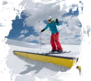 freestyle skier at sunshine village sliding a box